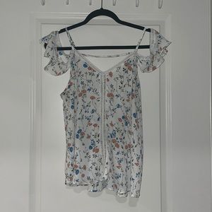 Off the shoulder, floral blouse.